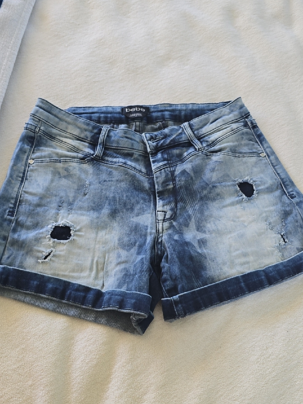 bebe Washed Blue Distressed Denim Shorts